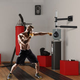 Wall-mounted punching trainer for reaction drills
