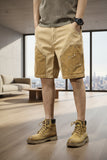 Men's paint splatter cargo shorts in khaki