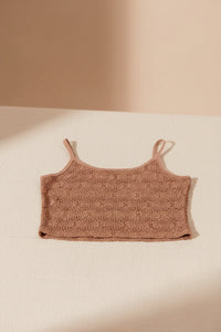 Close-up of floral and lace detailing on women's tank top