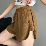 Side view of relaxed women's waffle shorts
