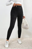 Side view of women's textured leggings