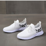 Women's white leopard print lace-up sneakers